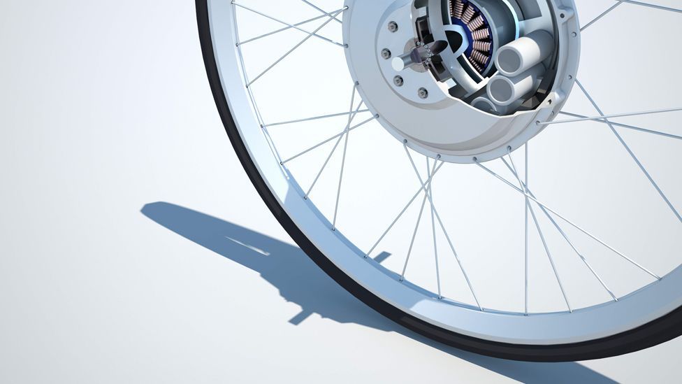 The Greenwheel turns any pedal-powered cycle into an electric one by fitting a special electric motor wheel. The bike is recharged through pedalling or the mains. (Copyright: MIT)