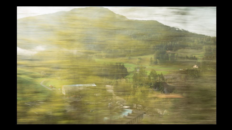 The region's dramatic landscape is sometimes obscured by trackside trees, as in this picture. (Photo: Rolf Sachs)