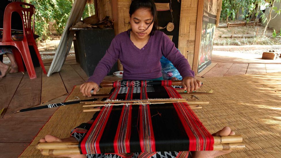 Weaving textiles at Ock Pop Tok, Laos