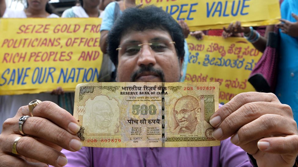 India, where cash and gold are kings