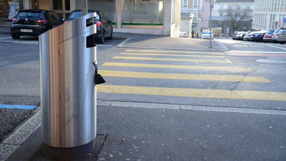 The opening to these bins in Switzerland is deliberately small to discourage large items. (Selena Savic) The opening to these bins in Switzerland is deliberately small to discourage large items. (Selena Savic)