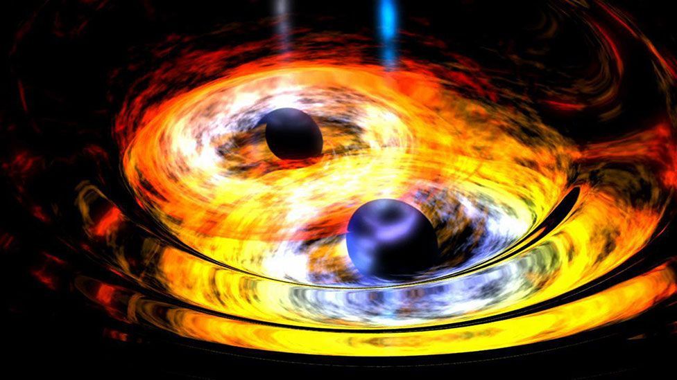 Two black holes begin merging into one, in this image created by Nasa; it believes two black holes are currently merging some 3.8 billion light years from Earth. (Nasa/AFP) Two black holes begin merging into one, in this image created by Nasa; it believes two black holes are currently merging some 3.8 billion light years from Earth. (Nasa/AFP)