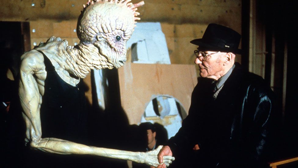 Burroughs with a Mugwump on the set of Naked Lunch in 1991. (Photos 12/Alamy)