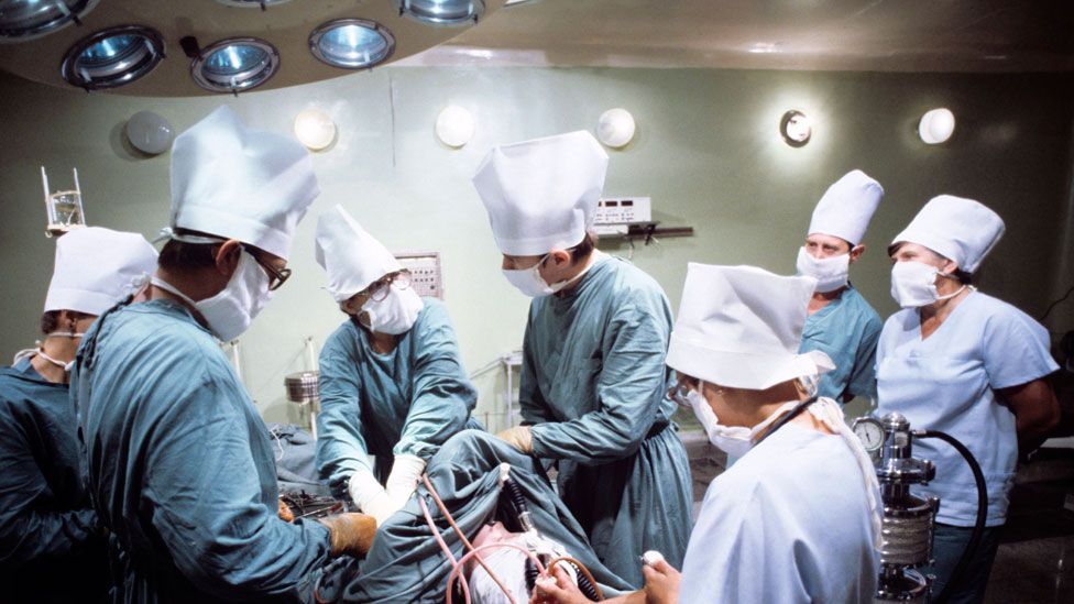 Surgeons performing a cardiac operation using hypothermic protection of the patient in Russia in 1979 (Science Photo Library) Surgeons performing a cardiac operation using hypothermic protection of the patient in Russia in 1979 (Science Photo Library)