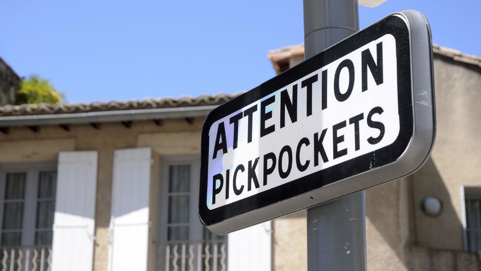 Pickpockets loiter near warning signs because people tend to check their possessions - revealing their location (Thinkstock)