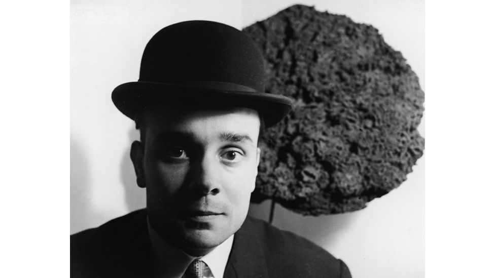 Klein photographed in front of one of his Blue Sponge Sculptures in the late 1950s (Express Newspapers/Getty Images)