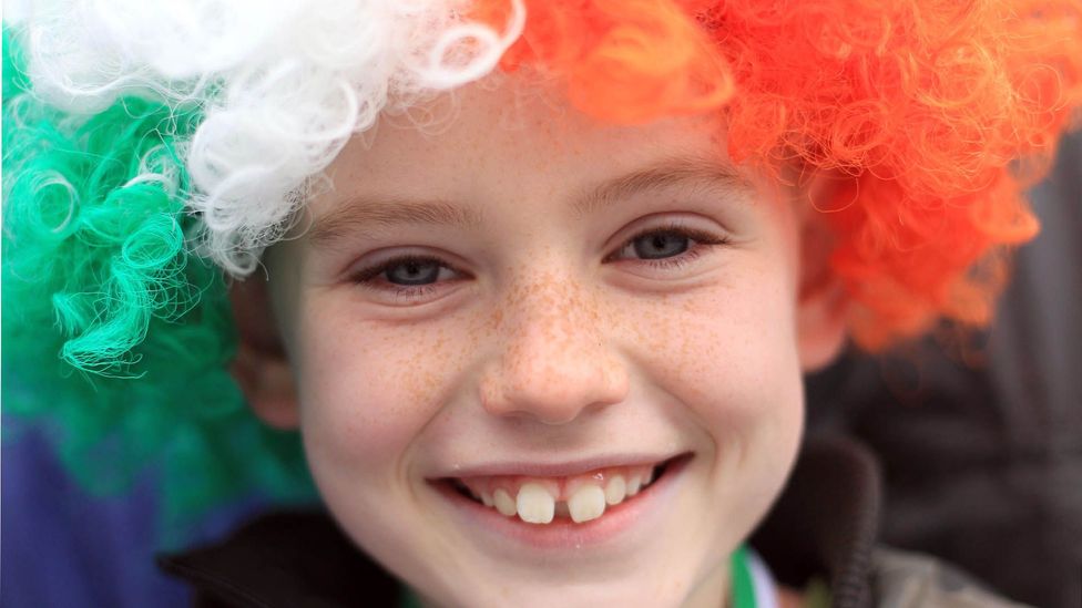 A boy smiles during St. Patrick's Day celebrations in Dublin. (Peter Muhly/Getty)