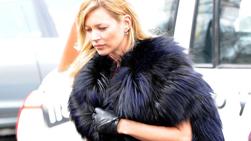 At the 2010 funeral of Alexander McQueen, Kate Moss wore a fur stole and five-inch stilettos (Jeremy Selwyn/Evening Standard/REX)