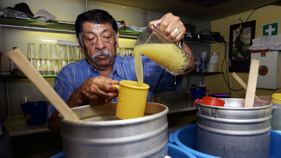 Pouring pineaple pulque in Mexico City. (Ronaldo Schemidt/AFP/Getty) Pouring pineaple pulque in Mexico City. (Ronaldo Schemidt/AFP/Getty)