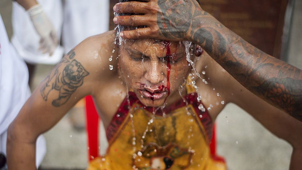 A devotee at Thailand's Vegetarian Festival (Getty Images)