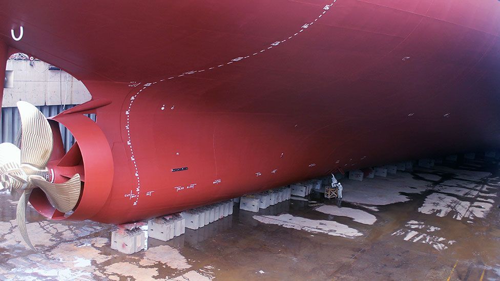 The welds of a recently completed steel hull are inspected for defects (Liam Young/Unknown Fields)