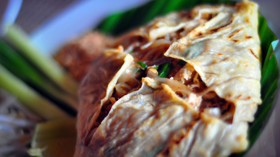 Pad Thai wrapped in egg. (Credit: Harpal Padwal/Getty)