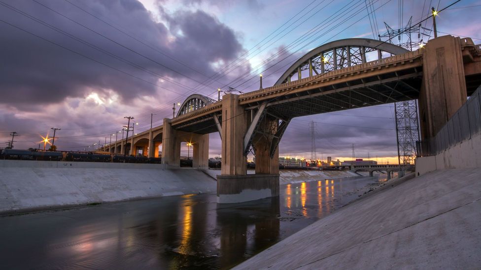 Admiring the sunrise under a bridge across the LA river (Credit: Shabdro Photo/Getty)