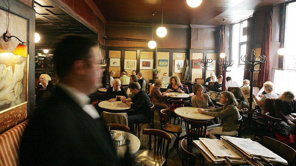 Finding idle time in the legendary Cafe Hawelka (Credit: Dieter Nagl/AFP/Getty Images) Finding idle time in the legendary Cafe Hawelka (Credit: Dieter Nagl/AFP/Getty Images)