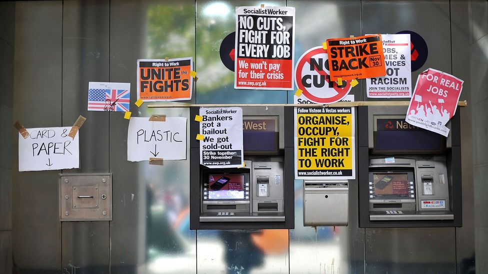 The Occupy Movement that gathered pace around the world in 2011-12 used posters to communicate with a mass audience (Credit: AFP/Getty Images) The Occupy Movement that gathered pace around the world in 2011-12 used posters to communicate with a mass audience (Credit: AFP/Getty Images)
