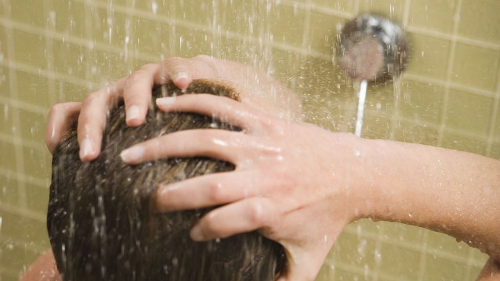Even if you shower every day, lint still collects (Credit: Getty Images)