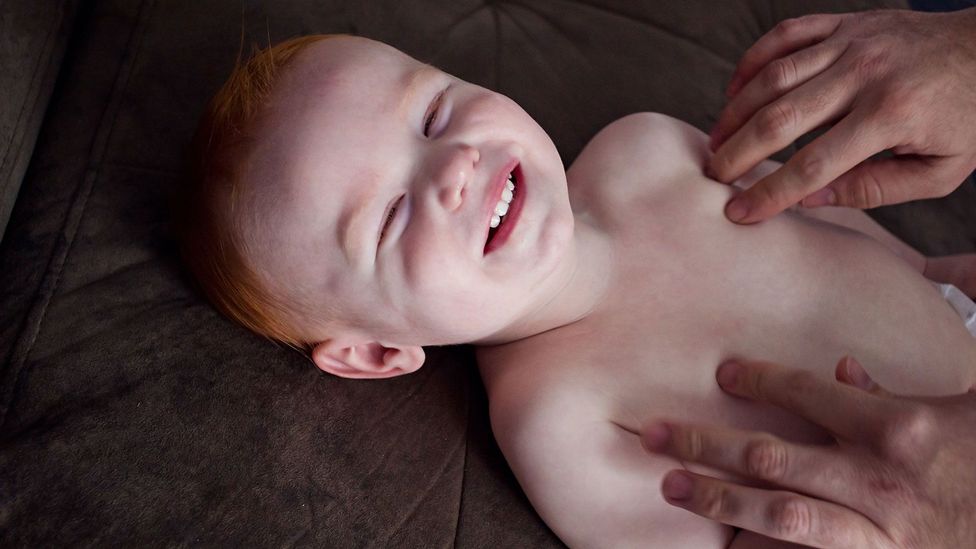 Why do babies laugh out loud?