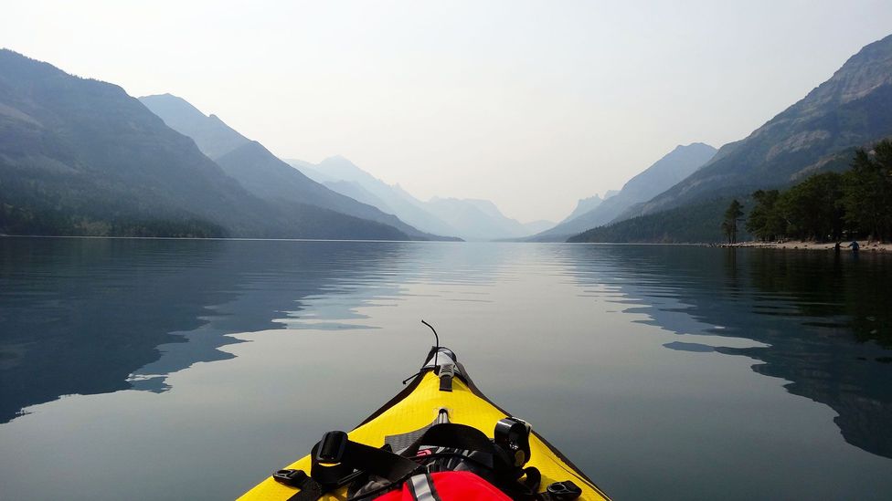 Kayaking beneath the mountains (Credit: Carol Patterson)