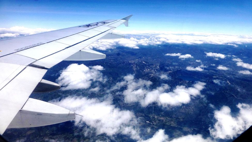 Views over Ecuador peek through the clouds (Credit: Larry Bleiberg)