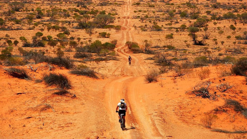 Biking through the Australian desert (Credit: Ezra Shaw/Getty)
