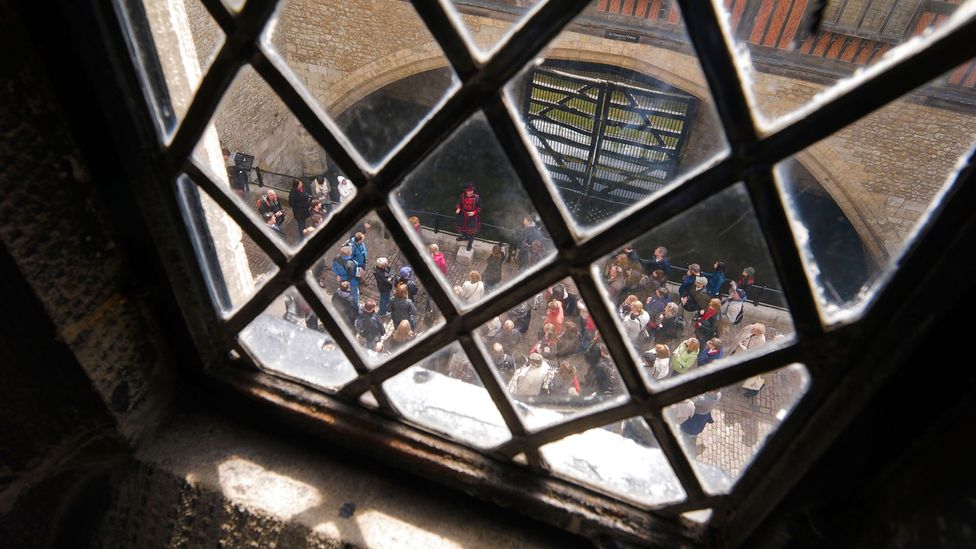 A Yeoman Warder guides tourists near Traitor’s Gate in the Tower (Credit: Martin Beddall/Alamy Stock Photo) A Yeoman Warder guides tourists near Traitor’s Gate in the Tower (Credit: Martin Beddall/Alamy Stock Photo)