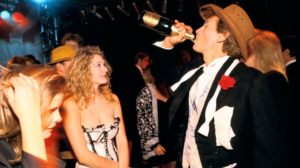 Young people party at a university ball; in the 2000s, drinking, and getting drunk, increasingly became the domain of 20-somethings (Credit: CountryCollection - Homer Sykes/Alamy) Young people party at a university ball; in the 2000s, drinking, and getting drunk, increasingly became the domain of 20-somethings (Credit: CountryCollection - Homer Sykes/Alamy)