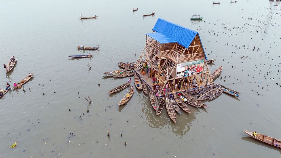 In Makoko, Dutch architects NLE have shaped a simple, yet beautiful timber school floating among lagoon houses (Credit: NLÉ, Iwan Baan)