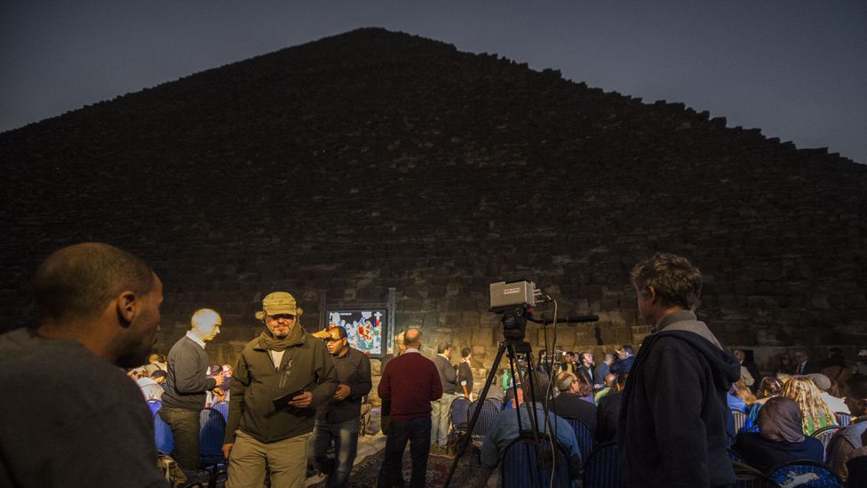 Researchers wait next to the great pyramids of Giza during an infrared thermography experiment to map the thermal footprint of the walls (Credit: Getty Images) Researchers wait next to the great pyramids of Giza during an infrared thermography experiment to map the thermal footprint of the walls (Credit: Getty Images)