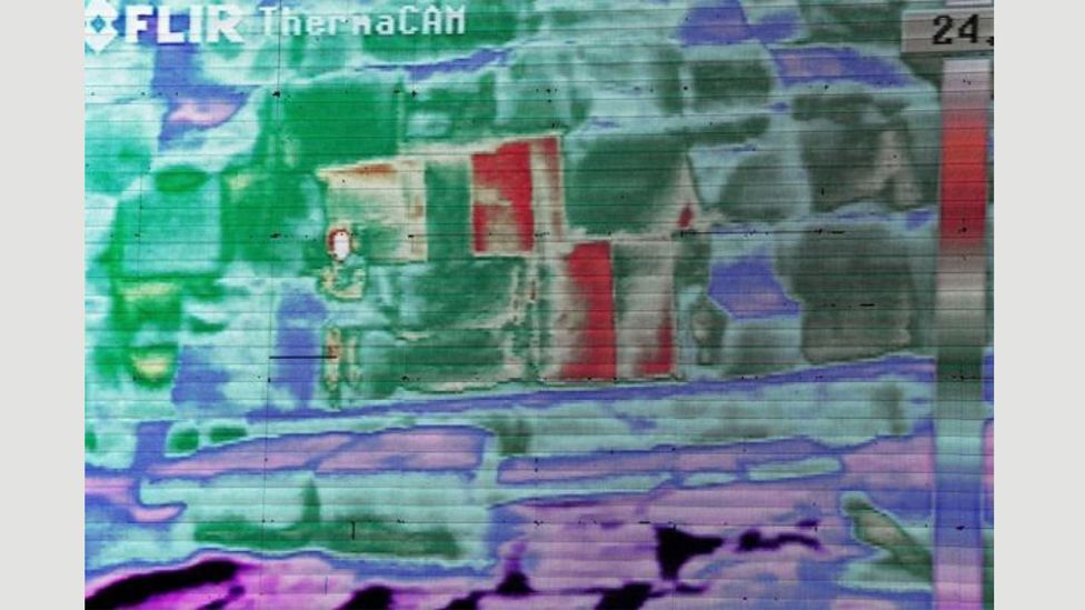 The thermal imaging reveals some of the external bricks in the pyramids are hotter (here shown in red) than others (Credit AP) The thermal imaging reveals some of the external bricks in the pyramids are hotter (here shown in red) than others (Credit AP)
