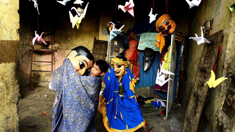 Kathputli is inhabited by puppeteers, magicians, acrobats, dancers and musicians (Credit: AFP/Getty)