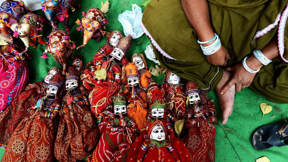 Many residents earn a living by performing with and selling handcrafted puppets (Credit: AFP/Getty)
