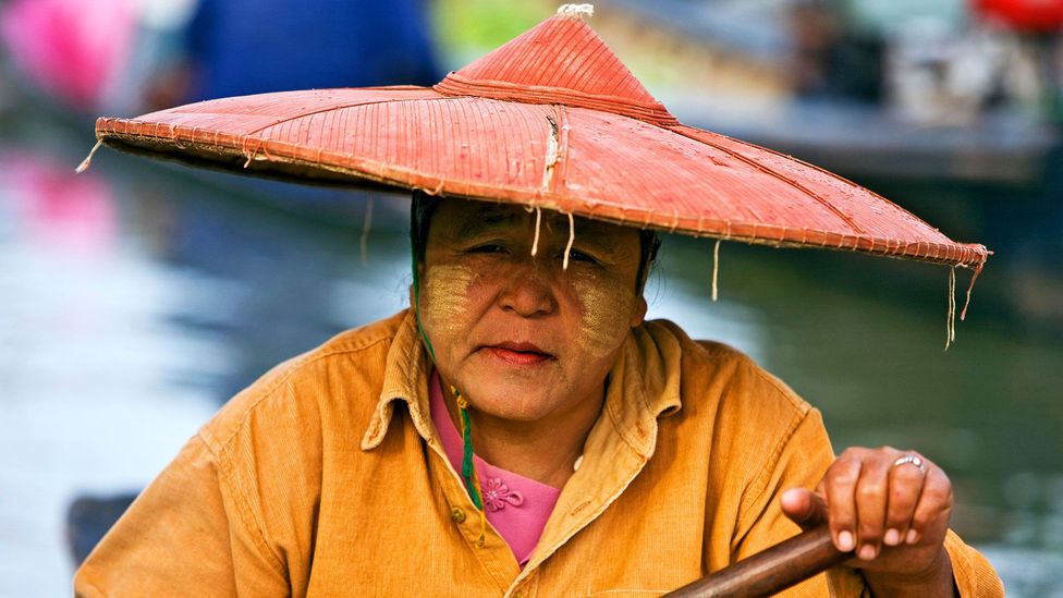 A Burmese woman at the floating market of Ywa-ma (Credit: Nigel Pavitt/Alamy)