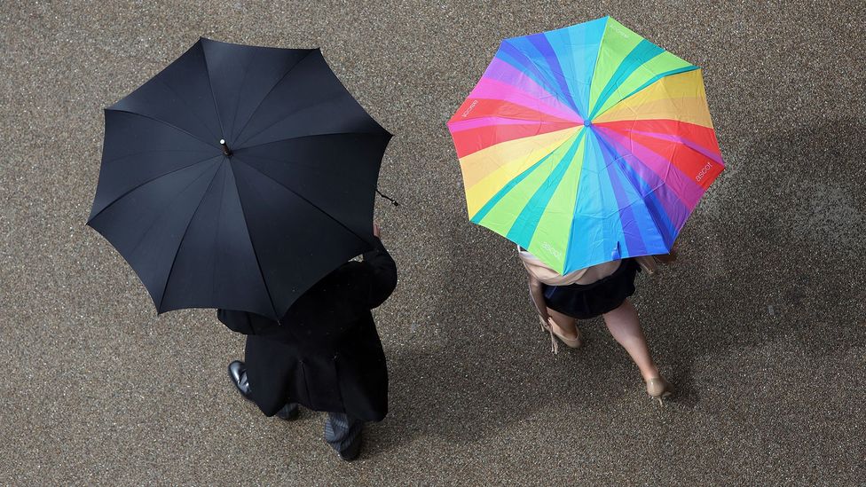 Even if you know it's raining out, British etiquette calls for you to phrase it as a question: 'Raining again?' (Credit: Agencja Fotograficzna Caro/Alamy)