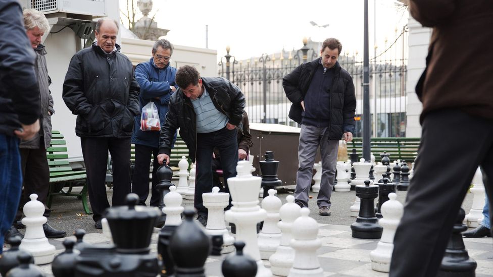 Men play chess in Geneva's Parc des Bastions (Credit: Martin Good/Thinkstock) Men play chess in Geneva's Parc des Bastions (Credit: Martin Good/Thinkstock)