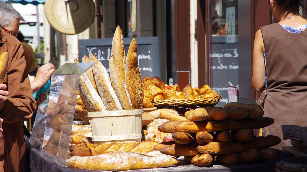 Shopping for bread is part of daily life in Dijon, France (Credit: Stephen Chapman/Alamy) Shopping for bread is part of daily life in Dijon, France (Credit: Stephen Chapman/Alamy)
