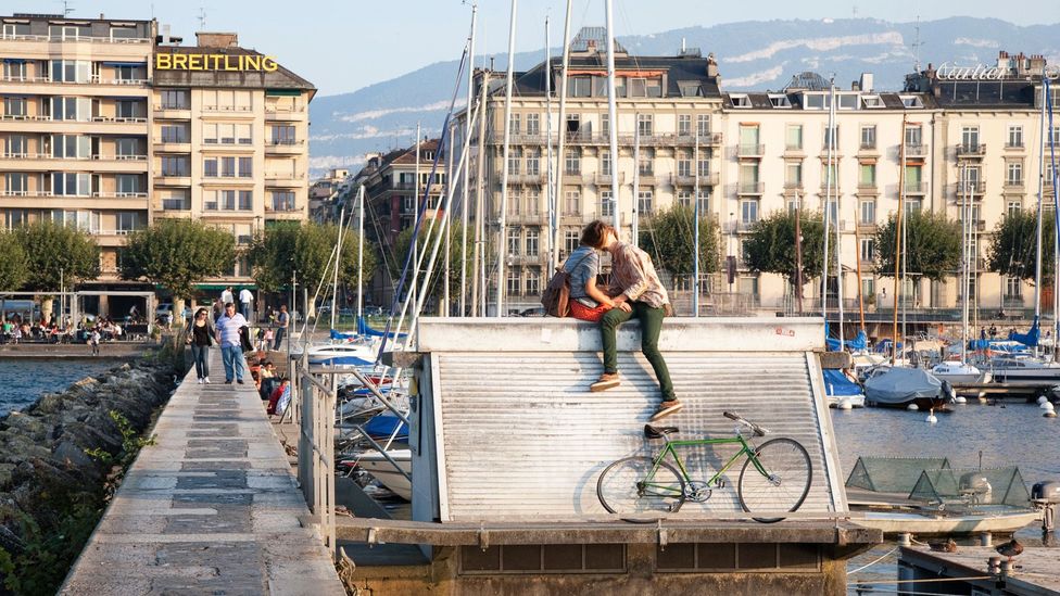 Couple Kissing on the Pier in Geneva, Switzerland (Credit: Kevin George/Alamy) Couple Kissing on the Pier in Geneva, Switzerland (Credit: Kevin George/Alamy)
