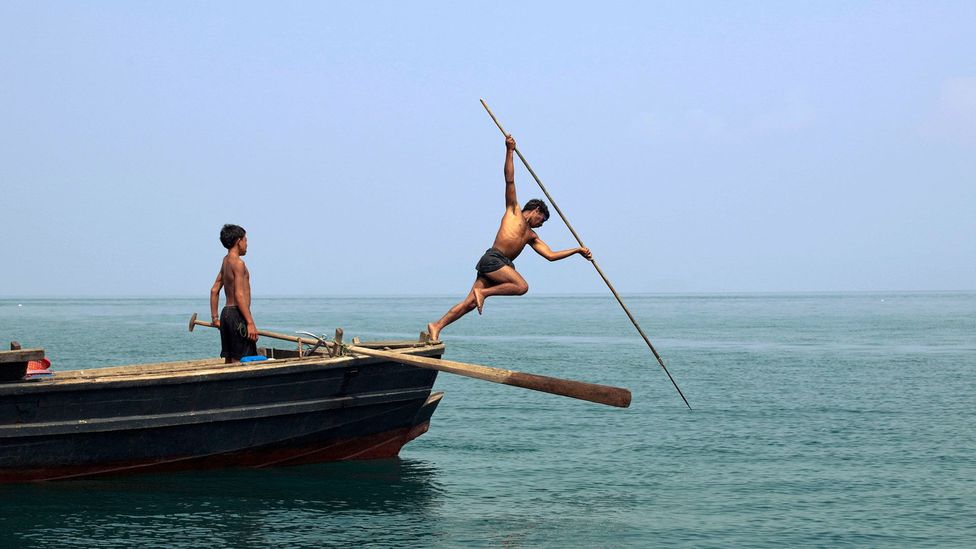 The adults in the tribe catch most of their food by spear fishing above the surface (Credit: Alamy)