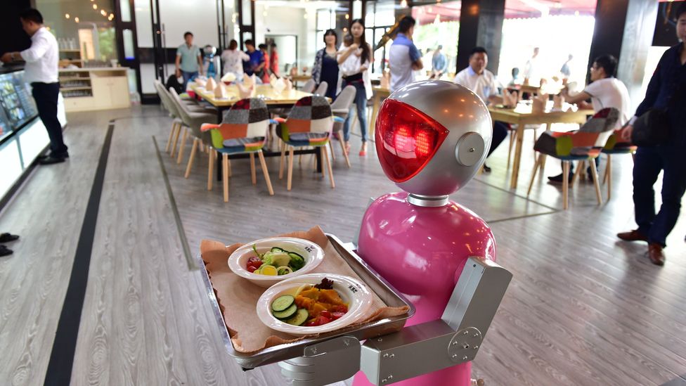 Moving up the ladder from waitressing soon robots may be handling your financial planning (Credit:ChinaFotoPress/ GettyImages) Moving up the ladder from waitressing soon robots may be handling your financial planning (Credit:ChinaFotoPress/ GettyImages)
