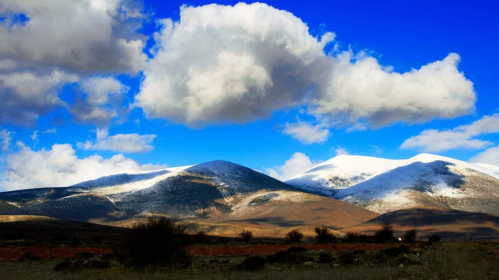 The village of Trasmoz is surrounded the snow-capped Moncayo mountains (Credit: Miguel Ángel García/Flickr)