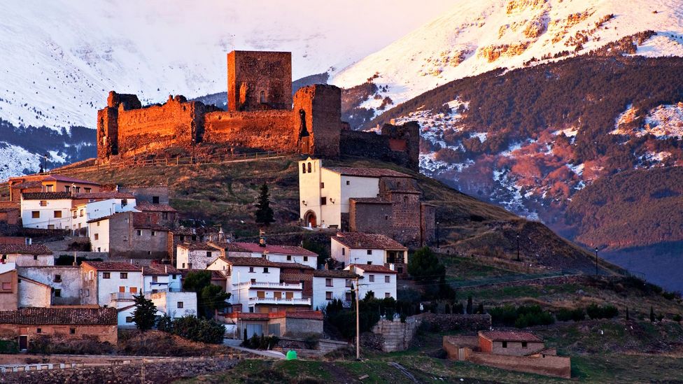 The half-ruined 12th-century Trasmoz Castle is perched on a hilltop above the village (Credit: Julio Alvarez German/Getty)