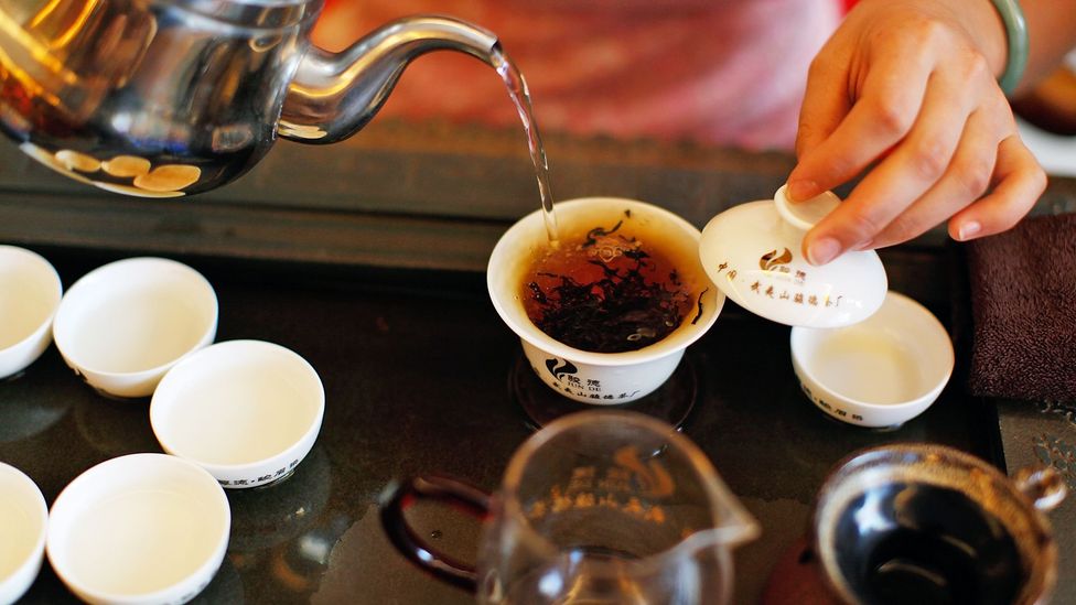 In China, drinking tea is considered an art form (Credit: Kevin Zen/Getty)