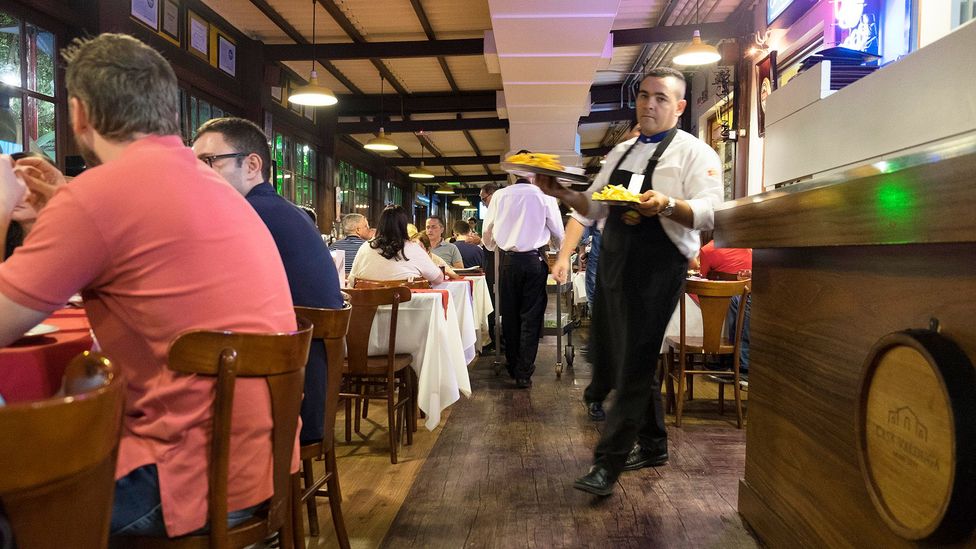 Local churrascarias like Churrascaria Barranco bustle in Brazil (Credit: Roberto Baibich)