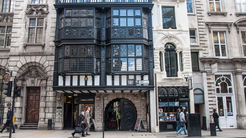 Behind a small stone archway on London's Fleet Street, a hidden world opens up (Credit: Amanda Ruggeri)