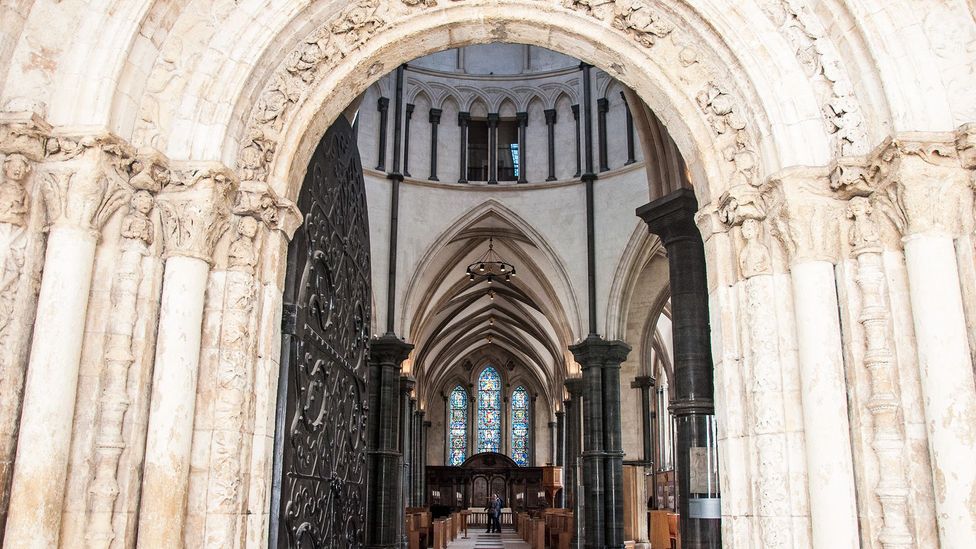 Peering through the original stone entrance of Temple Church (Credit: Amanda Ruggeri)