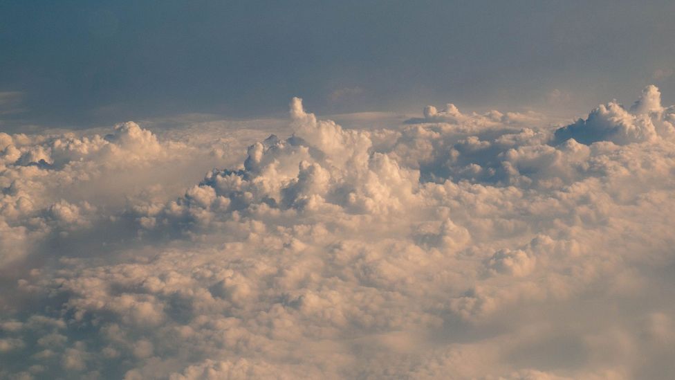 One method is to fly above the clouds and release rain-encouraging salts onto them (Credit: Getty Images)