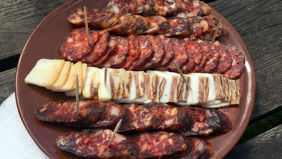 A charcuterie platter of Mangalica sausage, speck and donkey sausage (Credit: Kristin Vuković)