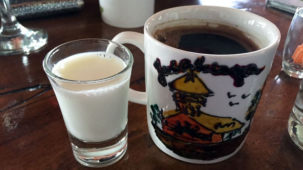 A glass of sweet donkey milk accompanies a cup of Turkish coffee (Credit: Kristin Vuković)