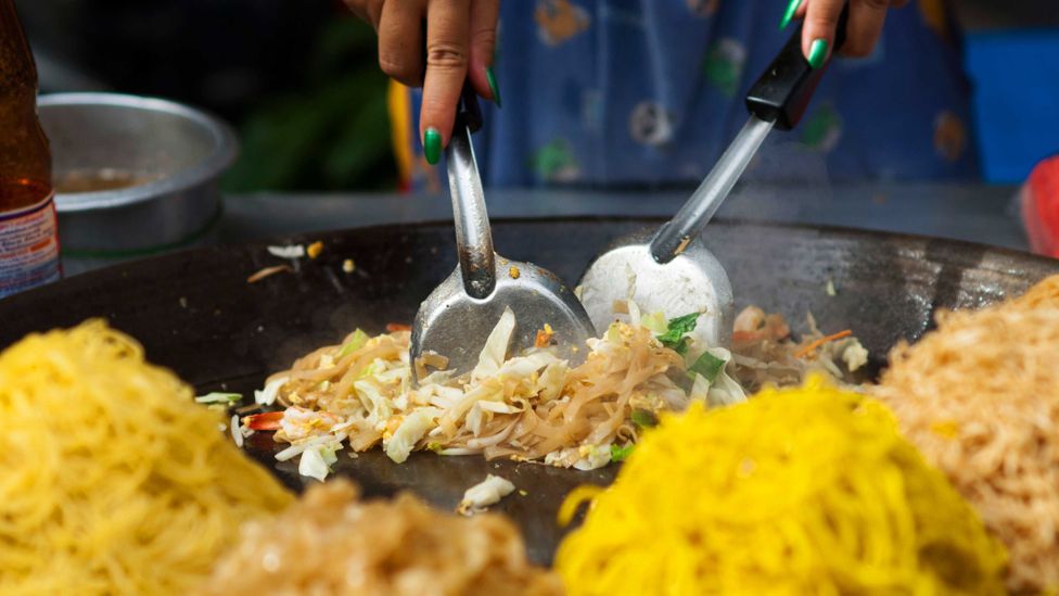 Pad thai is a staple of Bangkok's street food scene - but will it fall victim to the "cleaning up" of Bangkok's streets? (Credit: Karolina Webb/Alamy)