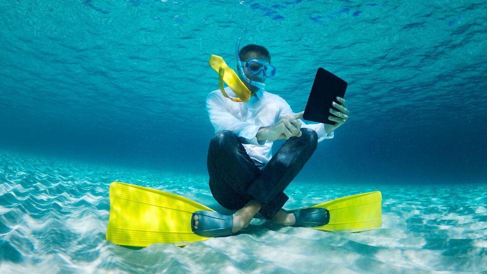 In 2014, 42% of employees surveyed by Randstad said that they felt like they had to check in on work while on vacation. (Credit: iStock) In 2014, 42% of employees surveyed by Randstad said that they felt like they had to check in on work while on vacation. (Credit: iStock)