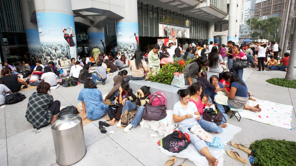 More than 300,000 domestic helpers congregate in urban areas like these (Credit: Radharc Images/Alamy)